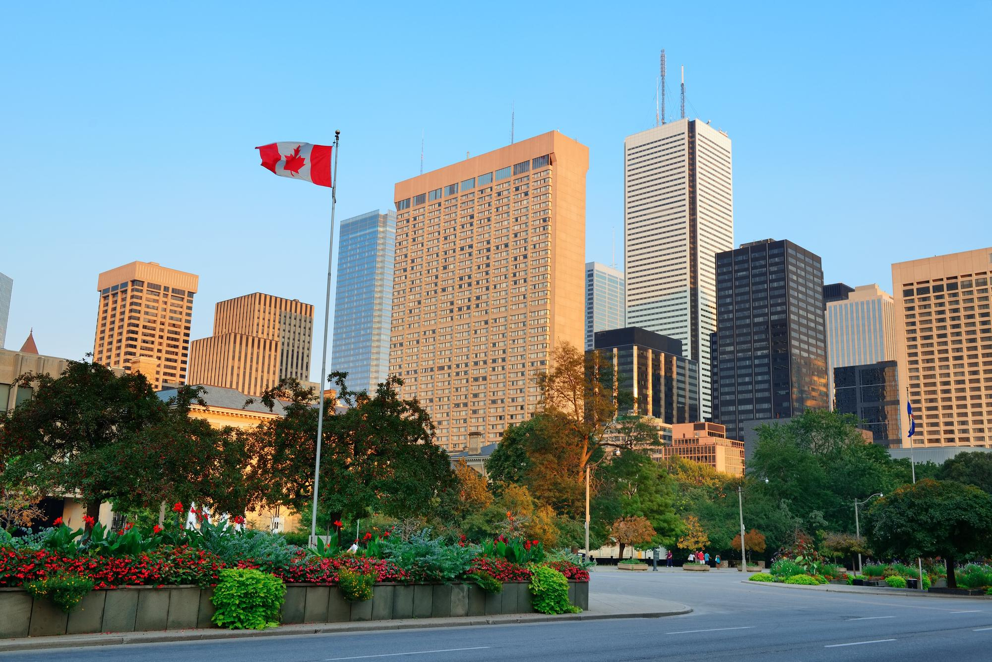 Downtown Toronto skyline with the Canadian flag